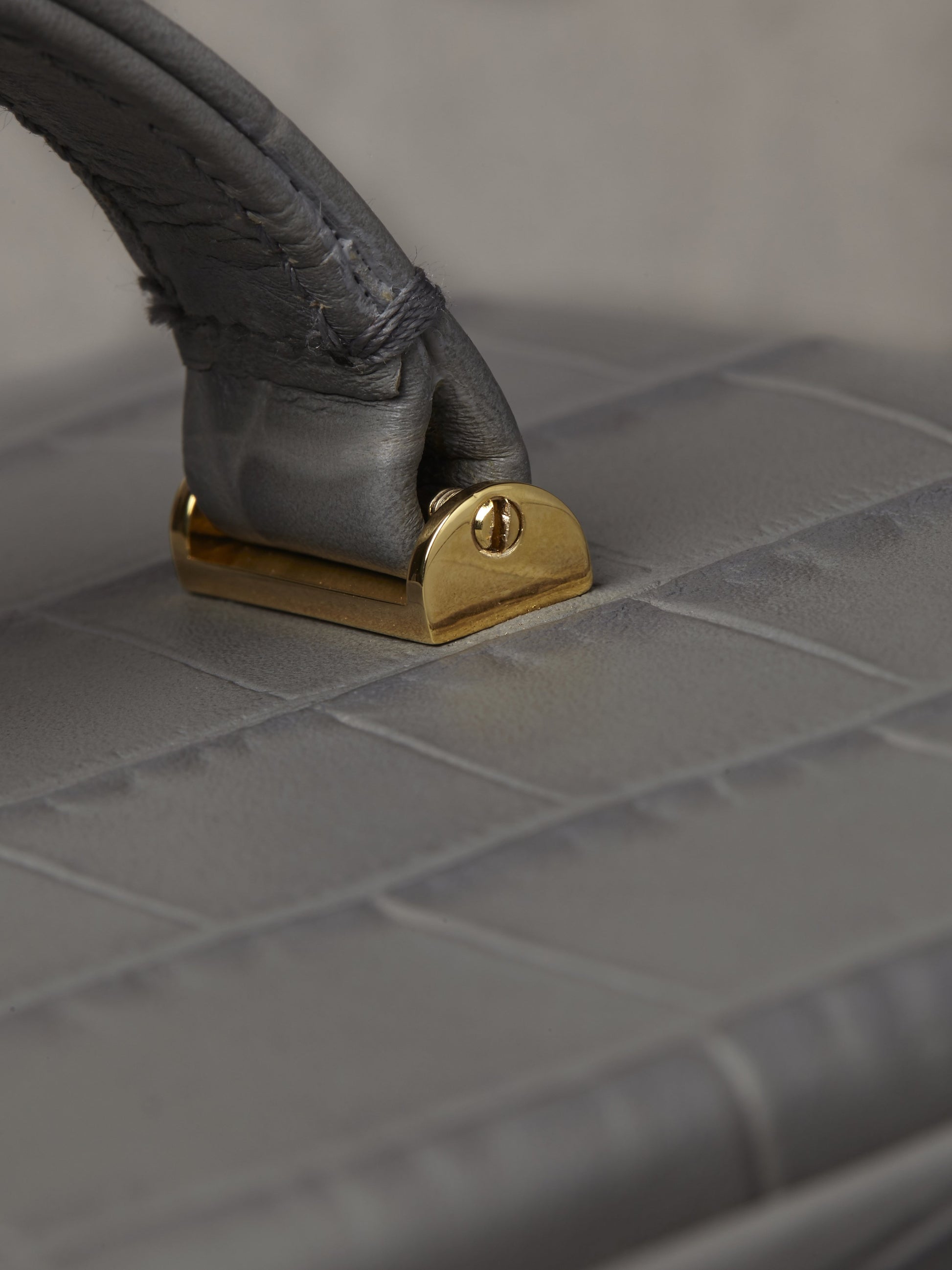 Atelier Verdi small grey crocodile print leather vanity case, gold handle clasp detail