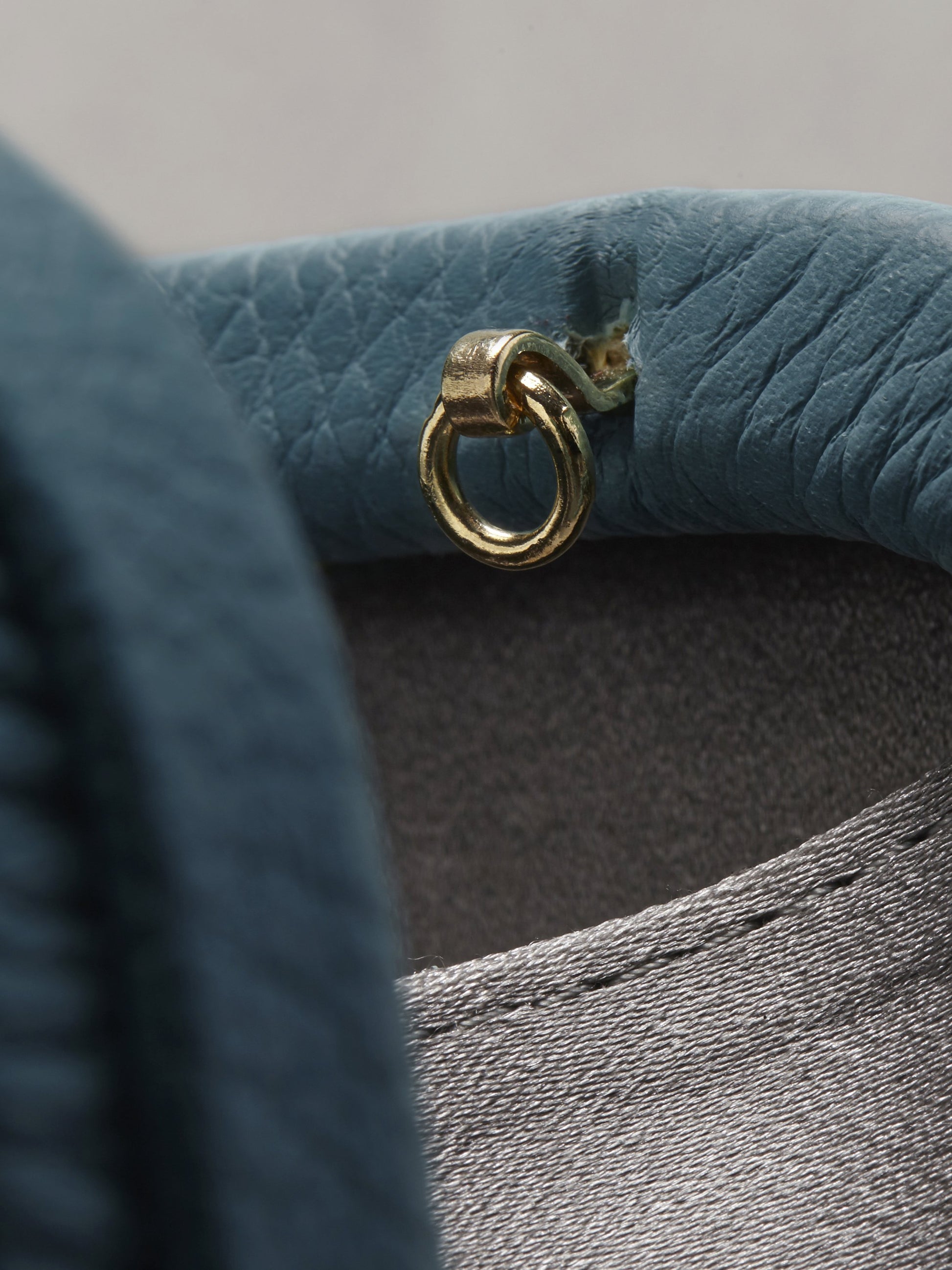 Atelier Verdi blue leather clutch bag, gold chain clasp detail