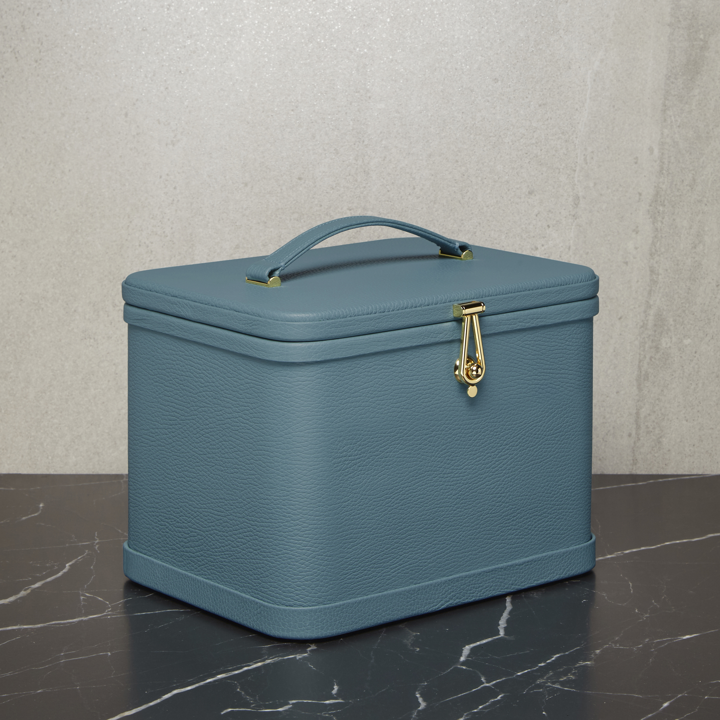 Atelier Verdi medium blue leather vanity case, side view